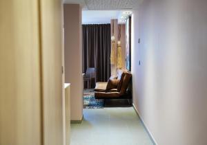 A seating area at Poem Apartments, Las Canteras
