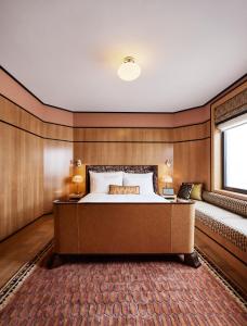 a hotel room with a bed and a window at Sommerro in Oslo