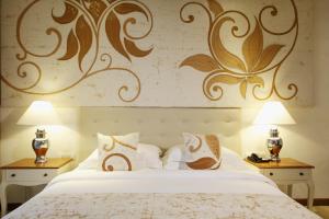 Postel nebo postele na pokoji v ubytování NH Bentota Ceysands Resort