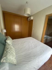 Postel nebo postele na pokoji v ubytování Casa Royal, Mancha Real, Jaén