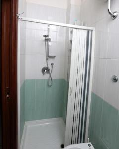 a bathroom with a shower with a toilet in it at Casa vacanza russo enzo in Naples +54 photos
