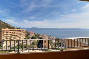 a balcony with a view of the water at Nouveau ! T2 neuf avec vue imprenable mer in Ajaccio