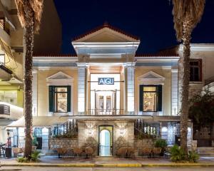 a building with an ak sign on the front at Kalamata Aigli Lux Seafront Retreats- Up to 11ppl in Kalamata