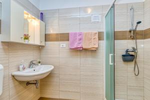 Koupelna v ubytování Apartment Complex Silva Rovinj + 82 fotografií