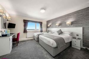Кровать или кровати в номере Viking Hotel - Adults Only