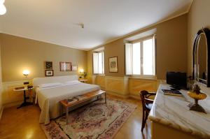 TV a/nebo společenská místnost v ubytování Hotel San Luca