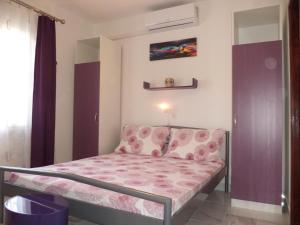 Postel nebo postele na pokoji v ubytování Apartment in Lopar with terrace, air conditioning, WiFi, washing machine 4229-3