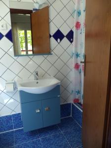 Koupelna v ubytování Apartment in Lopar with terrace, air conditioning, WiFi, washing machine 4229-3
