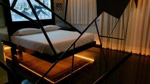 Postel nebo postele na pokoji v ubytování C rooms - Love Motel Monza