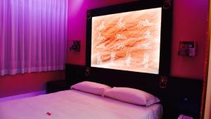 Postel nebo postele na pokoji v ubytování C rooms - Love Motel Monza + 32 fotografií