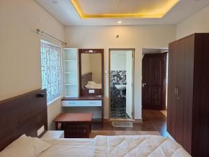 Postel nebo postele na pokoji v ubytování The green pride resorts + 61 fotografií