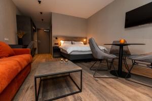 Postel nebo postele na pokoji v ubytování Hotel Halond