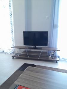 Televízia a/alebo spoločenská miestnosť v ubytovaní chloi house