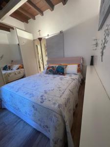 Säng eller sängar i ett rum på Casa Nicoli