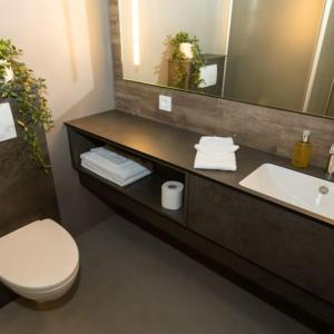 Koupelna v ubytování Hotel Halond
