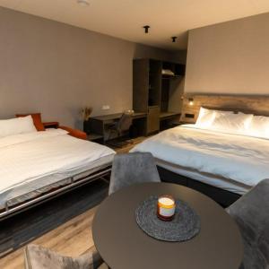 Postel nebo postele na pokoji v ubytování Hotel Halond