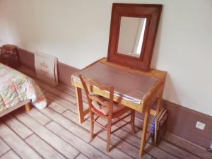 Posteľ alebo postele v izbe v ubytovaní Le Grand Feuvrier