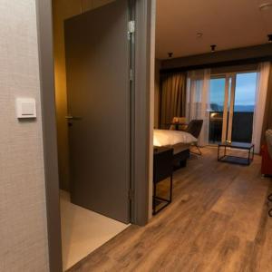 Postel nebo postele na pokoji v ubytování Hotel Halond