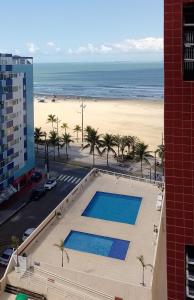 Pogled na bazen v nastanitvi Apartamento na Praia Grande - Guilhermina - Ótima Localização oz. v okolici