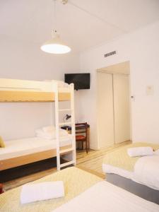 Postel nebo postele na pokoji v ubytování Hôtel du Simplon
