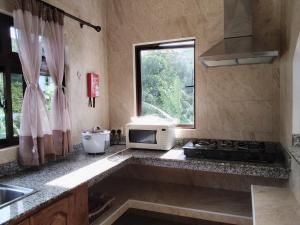 Cucina o angolo cottura di Belle Rose Vue guest house