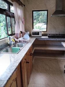 Cucina o angolo cottura di Belle Rose Vue guest house