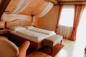 Postel nebo postele na pokoji v ubytování Eidenberger Alm