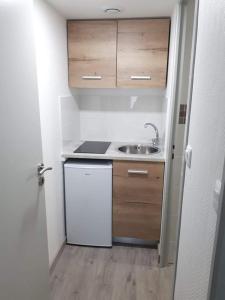 Kuchyňa alebo kuchynka v ubytovaní Studio 3 proche centre ville