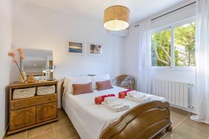 Postel nebo postele na pokoji v ubytování Casa de los Suenos + 21 fotografií