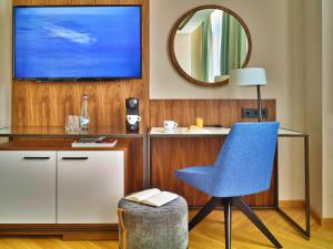 TV a/nebo společenská místnost v ubytování EST Grand Hotel Savoy