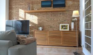 Televízia a/alebo spoločenská miestnosť v ubytovaní Enjoy Apartment 4 pax at Ruzafa with sunny terrace