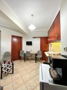 TV a/nebo společenská místnost v ubytování Ecco Apartments III