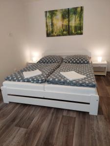 Postel nebo postele na pokoji v ubytování Apartmány Paseky - Jablonec nad Nisou