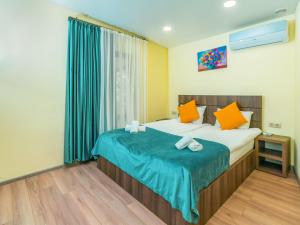Postel nebo postele na pokoji v ubytování Hotel Classic Suites