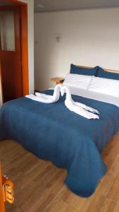 Postel nebo postele na pokoji v ubytování Cabaña Mirador Angelita
