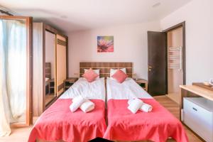 Postel nebo postele na pokoji v ubytování Hotel Classic Suites
