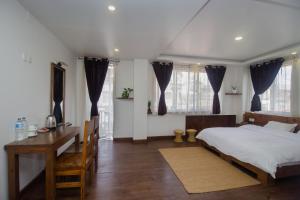 Llit o llits en una habitació de Yalamul Garden