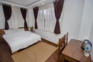 Llit o llits en una habitació de Yalamul Garden