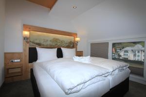Cama o camas de una habitación en Relax Apartments