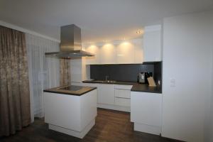 Una cocina o zona de cocina en Relax Apartments