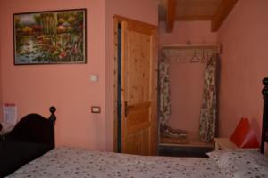 Postel nebo postele na pokoji v ubytování Cascina Trapella
