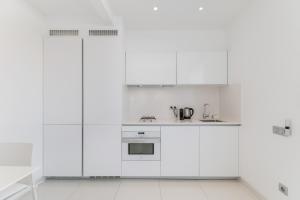 Kuchyň nebo kuchyňský kout v ubytování Beach penthouse Sitges Rentals