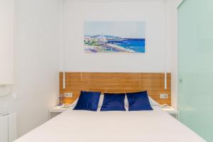 Postel nebo postele na pokoji v ubytování Beach penthouse Sitges Rentals