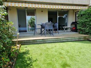 Un jardín fuera de Face au port - Vue mer - Jardin - Wifi - Ménage - 4 pers