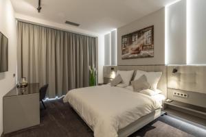 Postel nebo postele na pokoji v ubytování Port Karolina Luxury Residence