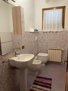 Kúpeľňa v ubytovaní Casa Sossi