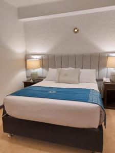 Cama ou camas em um quarto em Katari at Plaza de Armas Cusco