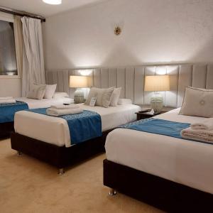Cama ou camas em um quarto em Katari at Plaza de Armas Cusco