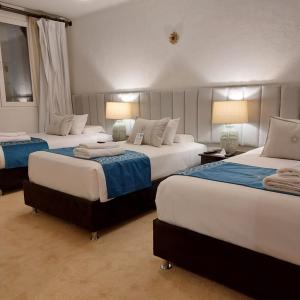 Cama ou camas em um quarto em Katari at Plaza de Armas Cusco
