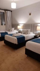Cama ou camas em um quarto em Katari at Plaza de Armas Cusco